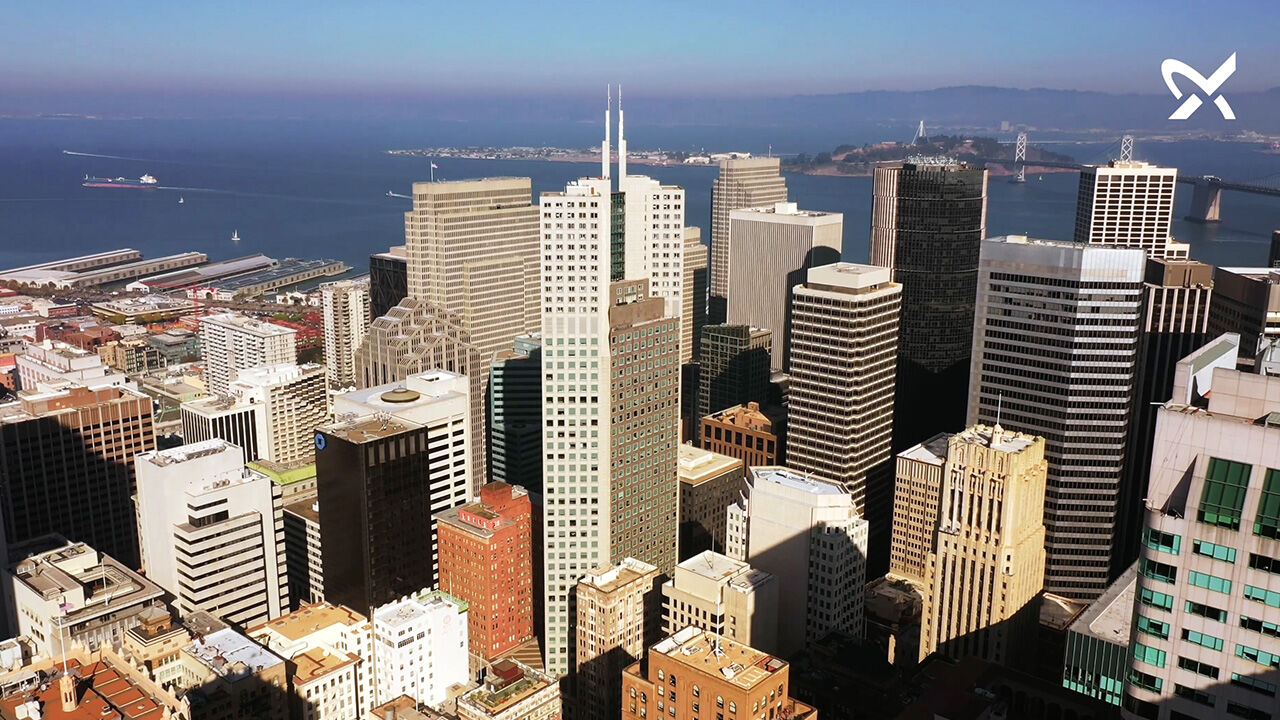 A beautiful photo of a city with water surrounding it for a case study video.