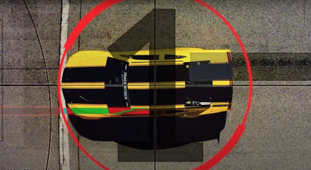 Top of yellow Track Attack race car with black stripes